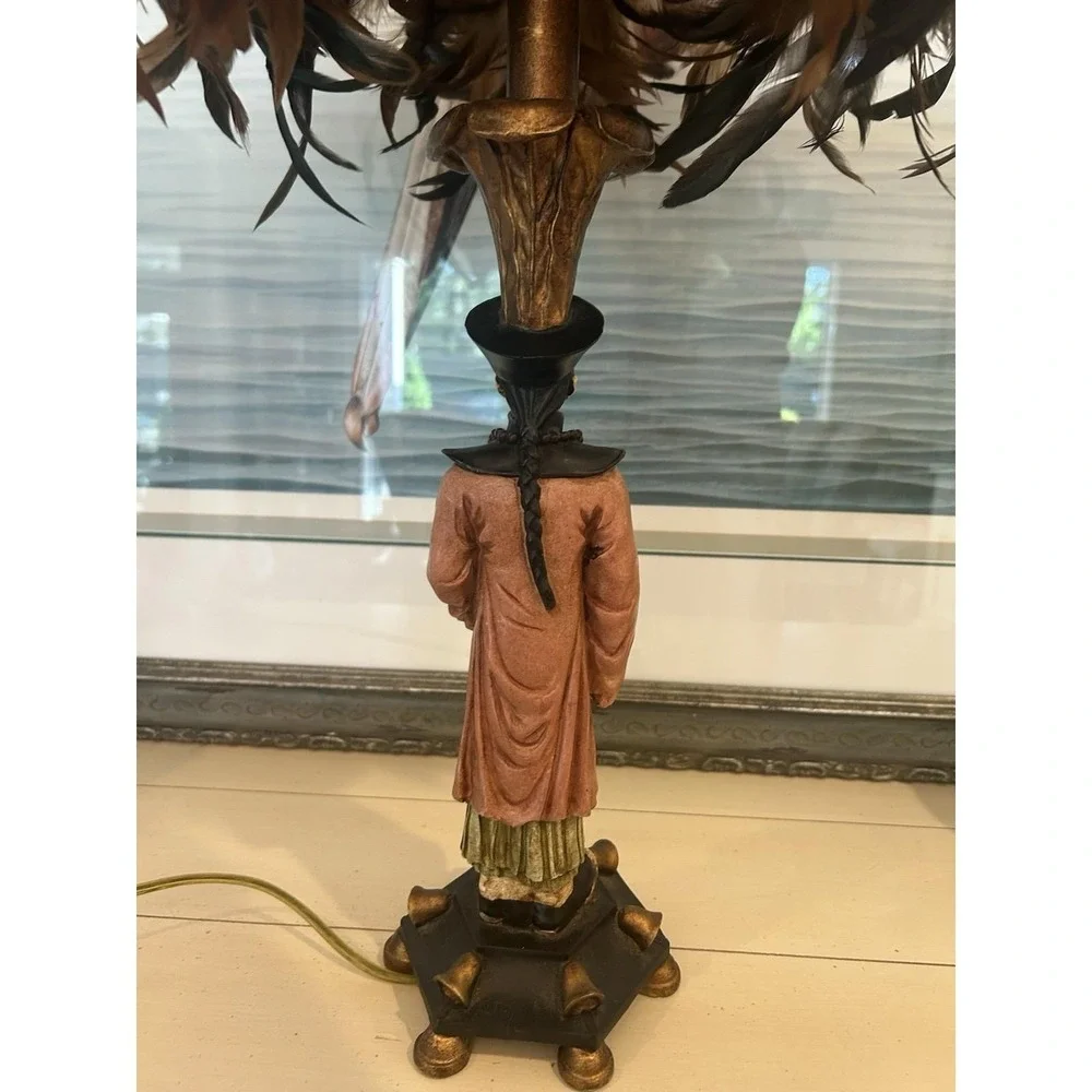Chinoiserie-style Asian man table lamp manufactured by Berman W/feather shade